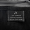 Close-up of interior tag showing that the lining is made from 100% post-consumer recycled plastic bottles.
