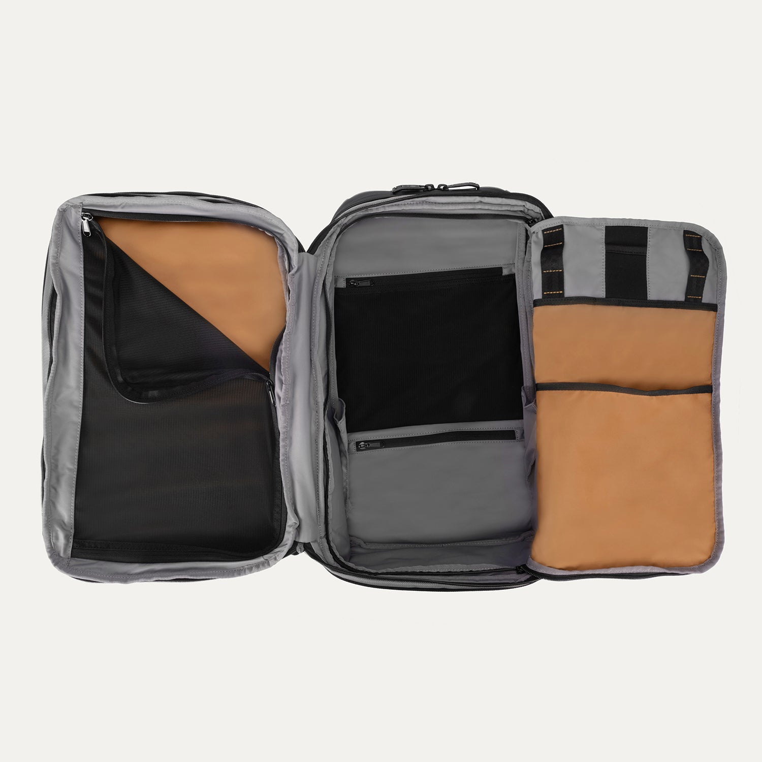 Interior view of Travelpro Altitude All-Purpose Laptop Backpack in Stellar Navy/Grey, showing multiple compartments and mesh zip pockets.
