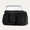 Rear view of the Travelpro Altitude Day-to-Day Duffel in black, featuring laptop storage in a padded exterior sleeve.
