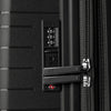 Close-up detail view of the Optima Expandable Compact Carry-on Spinner in Black, showcasing the integrated, TSA-compliant combination lock and secure, durable zipper pulls.