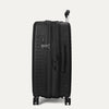 Side view of the Optima Expandable Medium Check-in Spinner in Black, highlighting the integrated side carry handle, the TSA-compliant lock, and the suitcase's sleek, durable side profile.